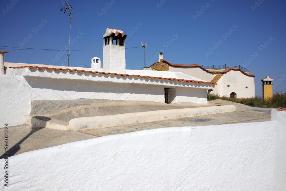 Barrio de Santiago - troglodyte houses carved in tuff rocks - Guadix - Andalusia - Spain