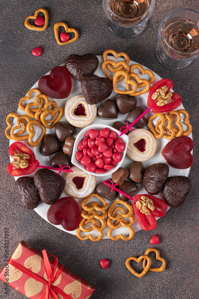 Plate of assorted heart sweets for Valentine's Day, top view Plate of assorted heart sweets for Valentine's Day, top view