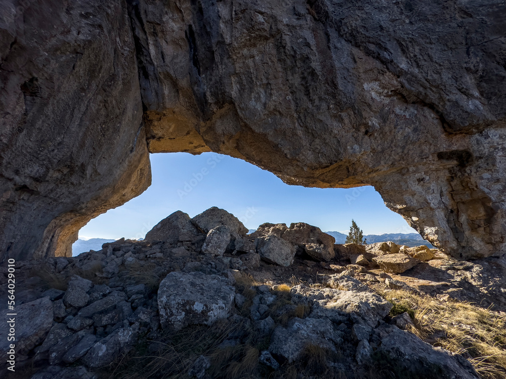 large caves with wide mouths in high mountains large caves with wide mouths in high mountains