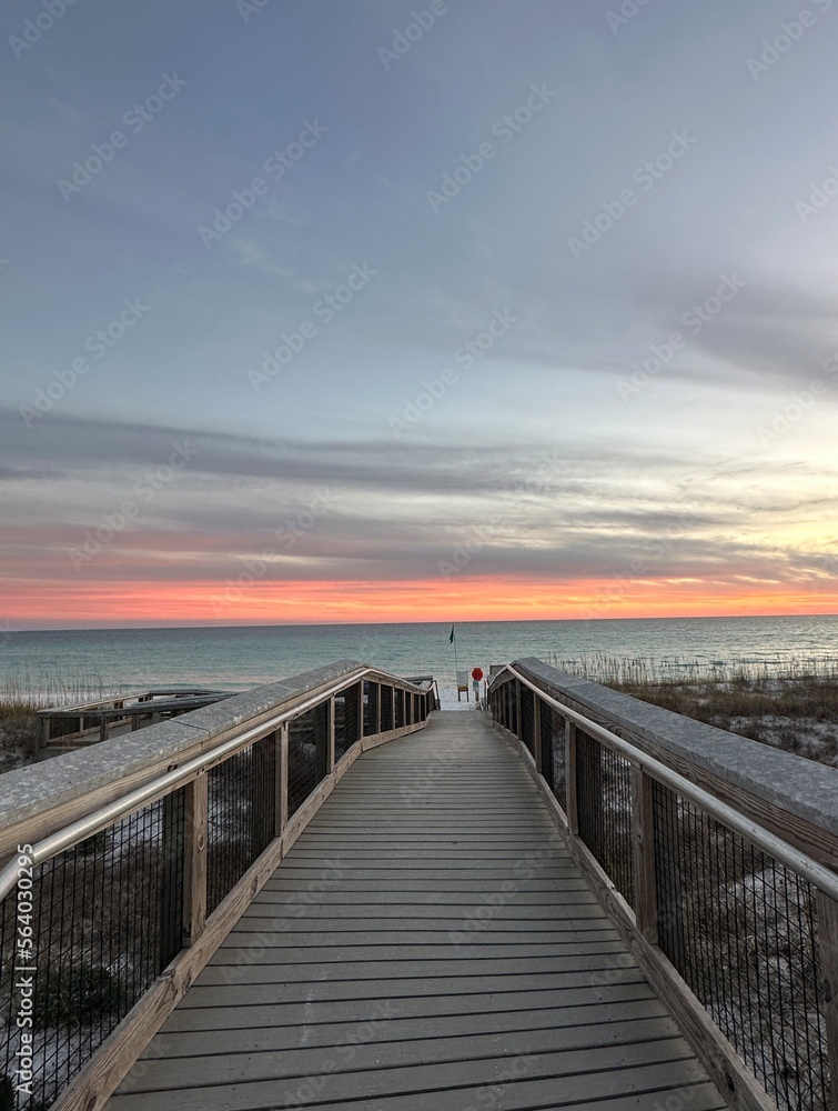 Walkway with sunset sky background over the Gulf of Mexico Emerald Coast Florida 