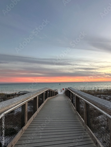 Walkway with sunset sky background over the Gulf of Mexico Emerald Coast Florida 