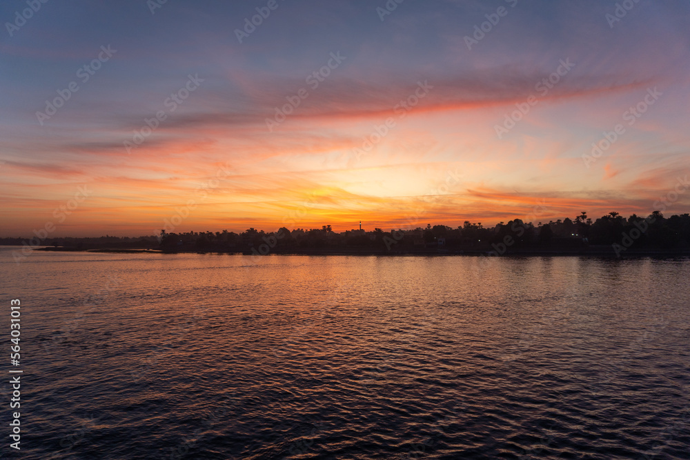 Sunset with some clouds on the Nile River