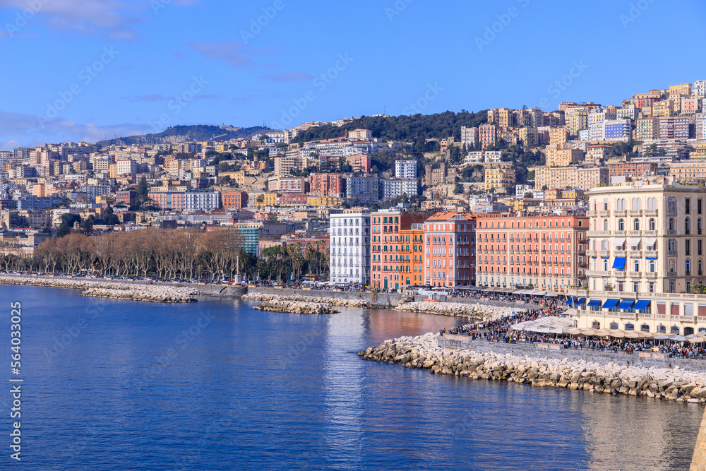 Cityscape of Naples waterfront from The Castel dell'Ovo in Italy.