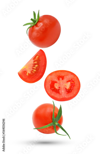 Whole and slice tomato falling in the air isolated on transparent background. PNG photo