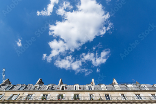 Scenic view of dramatic summer sky above facade in Paris