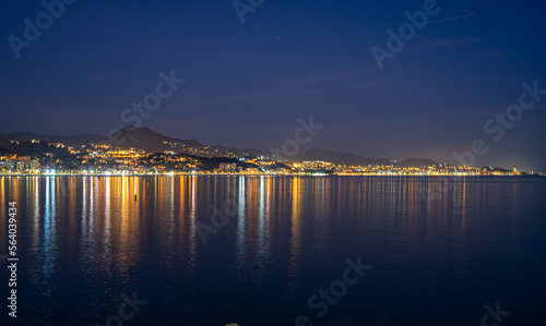 Panoramic view of night Malaga coastline, beach Malageta in Malaga, Spain on January 14, 2023 © Vitali