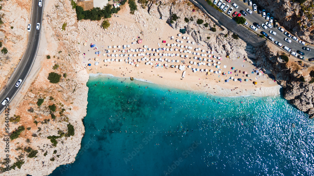 Aerial view of Kaputas beach between Kas and Kalkan, Turkey . Drone view of beach with beautiful,clear turquoise waters of the Mediterranean Sea. Popular and famous place for tourists