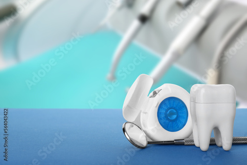 Plastic tooth with dental f...