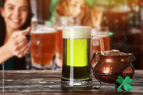 Glass of beer and pot with ...