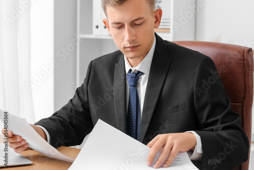 Handsome businessman workin...
