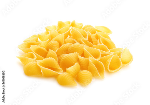 Heap of raw conchiglioni pasta isolated on white background