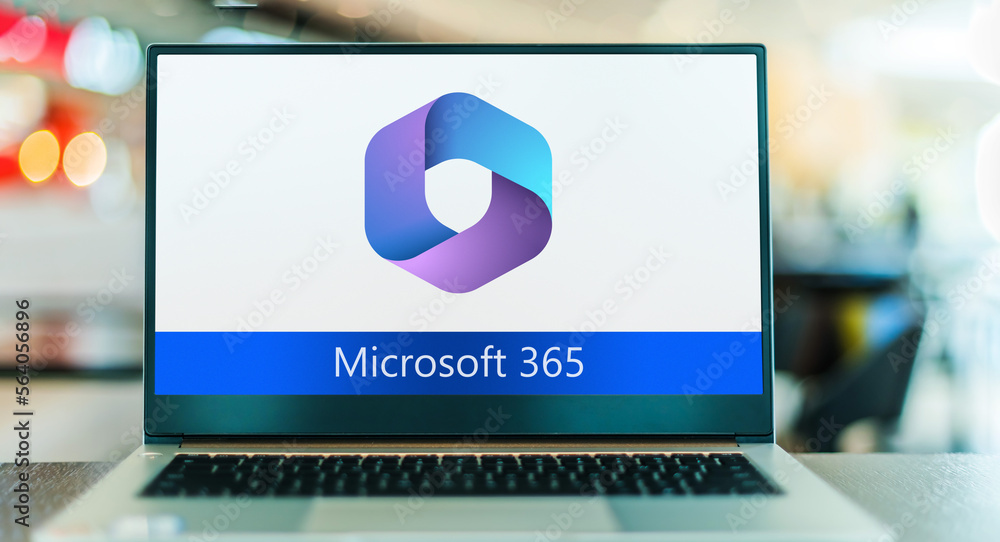 Laptop computer displaying logo of Microsoft 365 Stock Photo | Adobe Stock