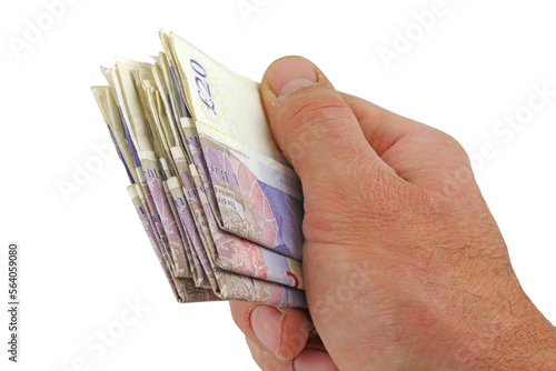 A male hand holding folded twenty pounds notes , transparent png