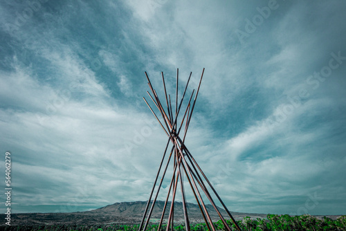 Tepee frame against the Big Sky in Montana. 