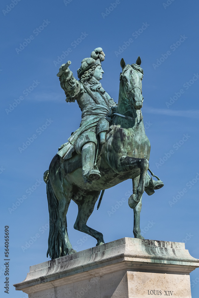Equestrian statue of Louis XIV (1836) in front of Palace of Versailles. Palace Versailles was a royal chateau. Versailles, Paris, France. 