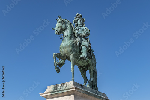 Equestrian statue of Louis XIV (1836) in front of Palace of Versailles. Palace Versailles was a royal chateau. Versailles, Paris, France. 