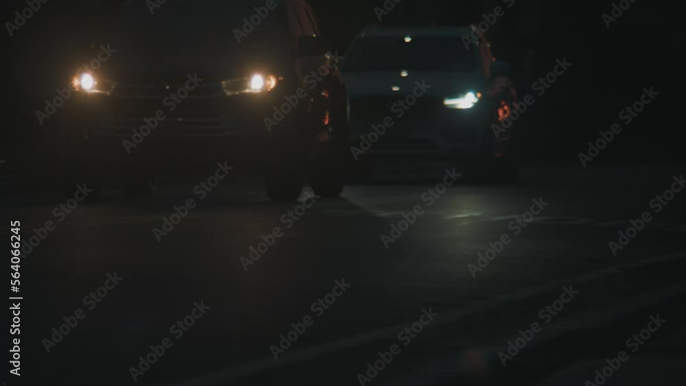 Cars driving on night road