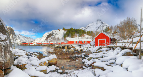 Amazing morning seascape of Norwegian sea and cityscape of Nusfjord village.