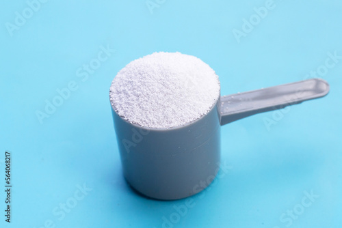 Detergent powder for clothes washing. Laundry concept.