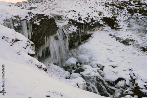 Frozen Waterfall Highlands of Iceland in Winter photo