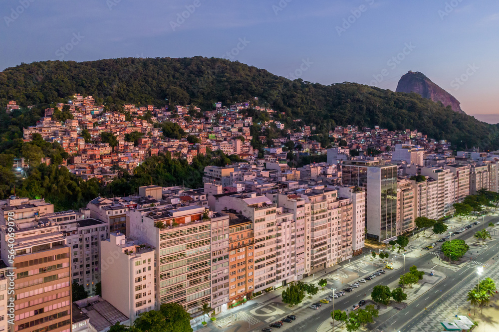 Aerial drone view of Leme neighbourhood in Copacabana with Babilonia favela in the background at sunrise, Rio de Janeiro, Brazil