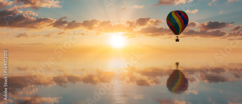 Hot Air Balloon Flying over the Calm Water. Dramatic Sunset Sky. 3d Rendering. Adventure Travel Concept