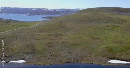 Aerial view of fell landscape at lake Guolasjavri reservoir in summer, Birtavarre, Troms og Finnmark, Norway. photo