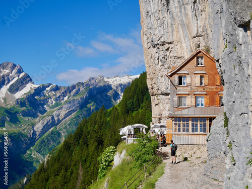 Aescher, Switzerland's iconic cliffhanging mountain restaurant, most beautiful place in world. Alpstein, Appenzell.