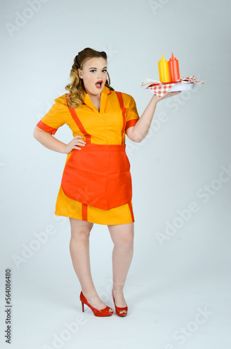 Vintage Retro Waitress in Studio With Serving Tray