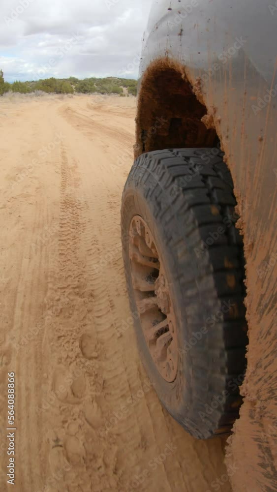 Vertical video of off road 4X4 truck in desert landscape Vertical video of off road 4X4 truck in desert landscape