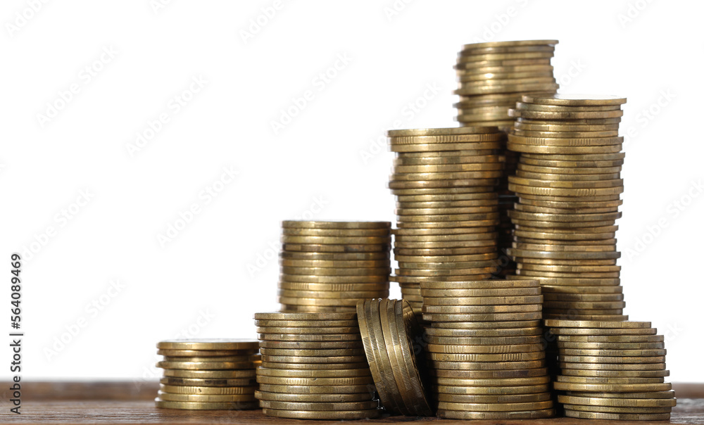 Stack of coins on wooden table, closeup. Space for text Stack of coins on wooden table, closeup. Space for text