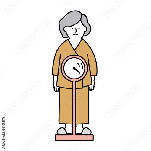 健康診断で体重計に乗る・体重を測る女性　イエロー