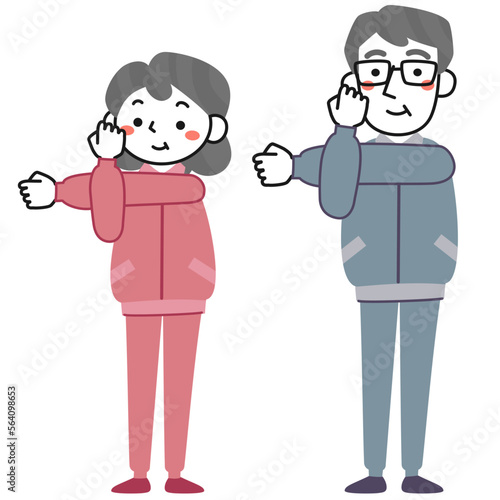 腕のストレッチをするシニア女性とシニア男性