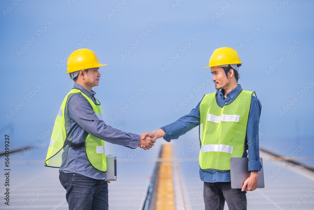 Team professional engineer working at solar power station Team professional engineer working at solar power station