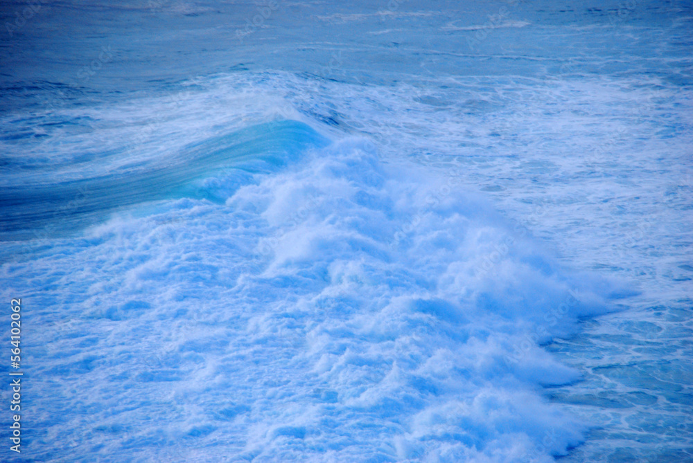 Blue sea marine ocean seascape tropical huge wave on blurred background. Seascape blue ocean white wave motion outdoor. Aqua marine huge wave sea summer background. Paradise turquoise water landscape Blue sea marine ocean seascape tropical huge wave on blurred background. Seascape blue ocean white wave motion outdoor. Aqua marine huge wave sea summer background. Paradise turquoise water landscape