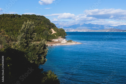 View of Erimitis coast landscape near Kassiopi and Agios Stefanos village, Corfu island, Kerkyra, Greece, with hiking trail path, forest and beach in a summer sunny day