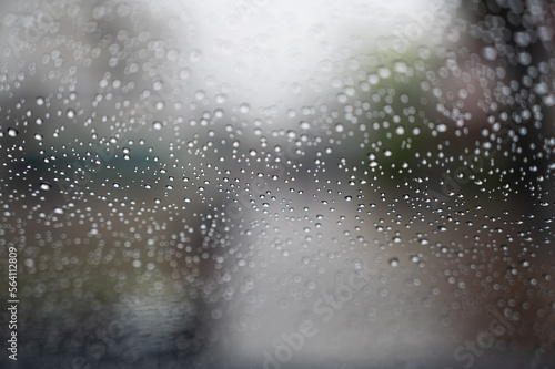 Rain drops on mirror car.