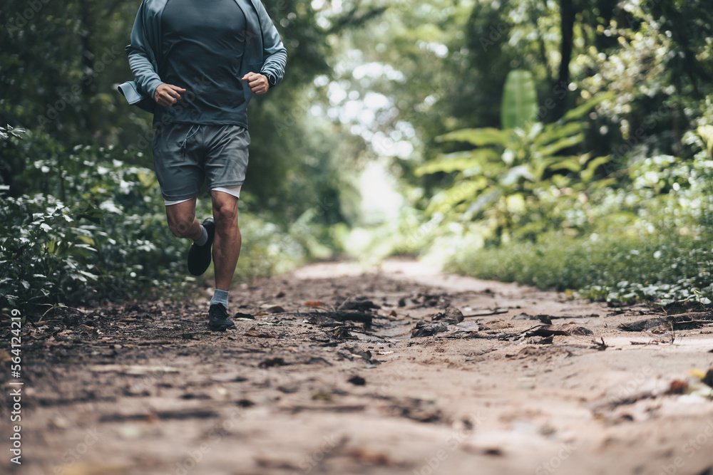 healthy lifestyle young fitness man running the forest. Outdoor workout, Healthy lifestyle concept. healthy lifestyle young fitness man running the forest. Outdoor workout, Healthy lifestyle concept.