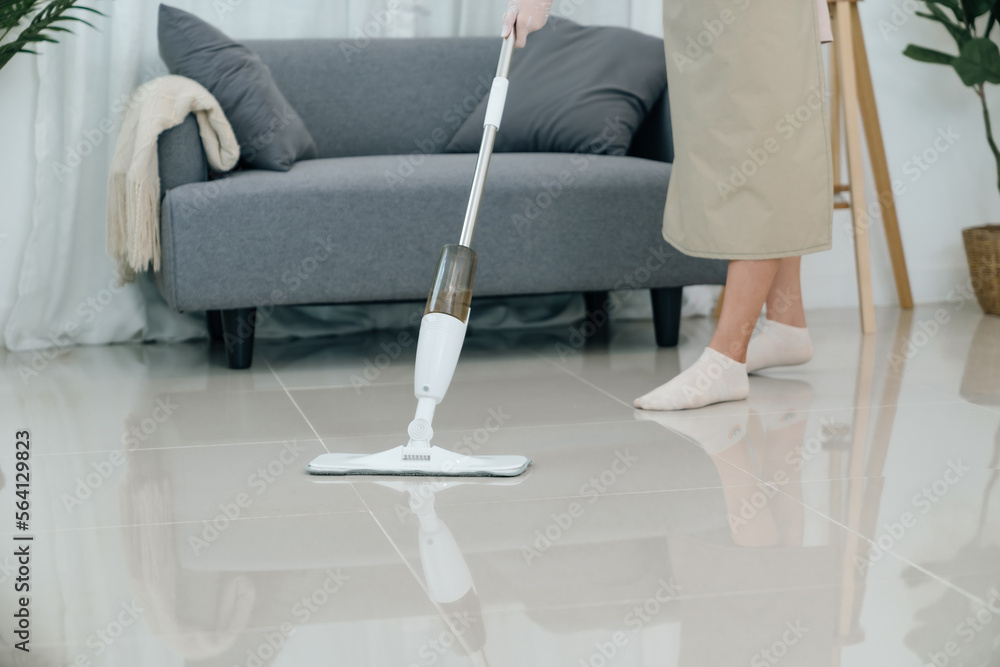 Happy Asian woman house wife making perfect preparing to clean home Happy Asian woman house wife making perfect preparing to clean home