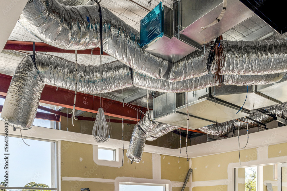 construction site showing the interior of a roof with installation of ...