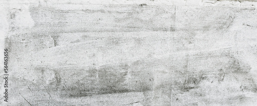 Tło, tekstura grunge naturalnej postarzanej ściany po nałożeniu siatki elewacyjnej. Klej i siatka do systemu dociepleń. © Janusz