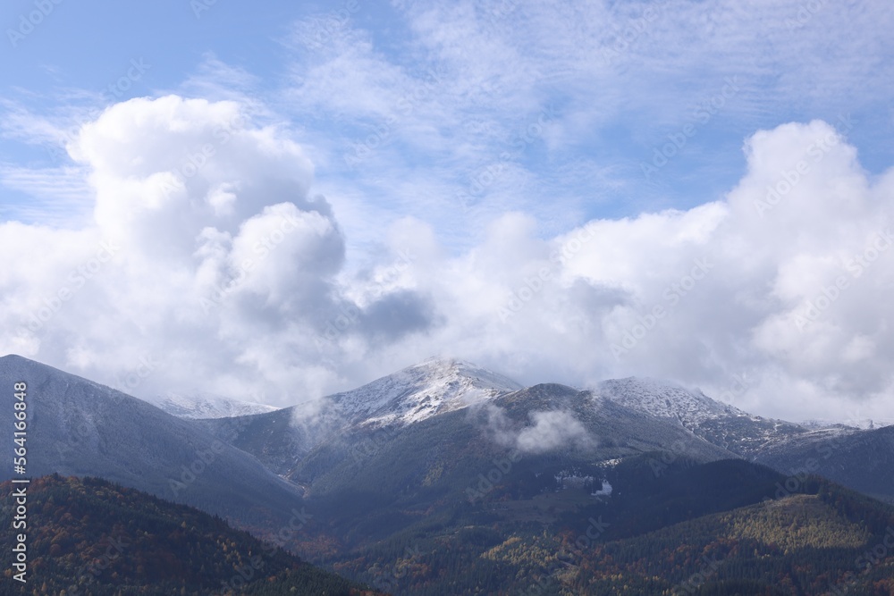 Picturesque view of beautiful mountains and sky Picturesque view of beautiful mountains and sky
