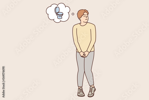 Stressed man standing and want to pee