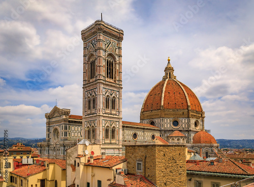Ornate marble facade of the Duomo Cathedral and Giotto tower in Florence, Italy