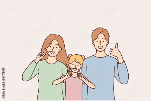 Happy people with braces on their teeth