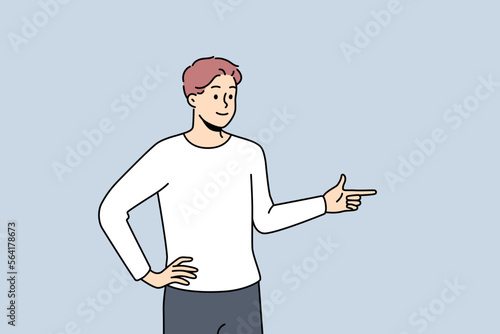 Smiling young man point aside demonstrate good deal or offer. Happy man recommend sale or promotion. Client feedback concept. Vector illustration. 