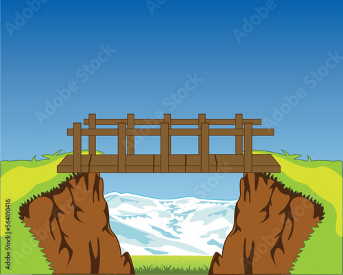 Landscape of the deep ravine and wooden bridge through it