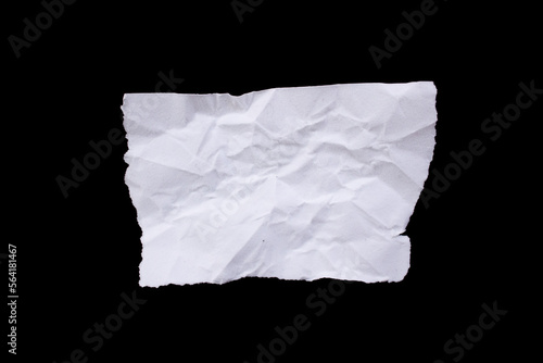 Blank torn paper isolated on black background. Top view of white paper piece with copy space. © Emre Akkoyun
