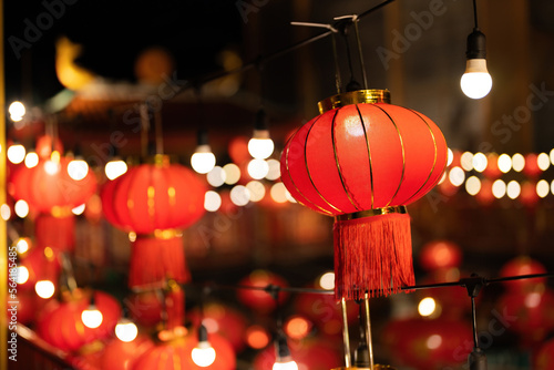 Chinese New Year lanterns and light bulbs adorn the Chinese New Year festival to celebrate. There is a beautiful bokeh in the background. in the old town area.