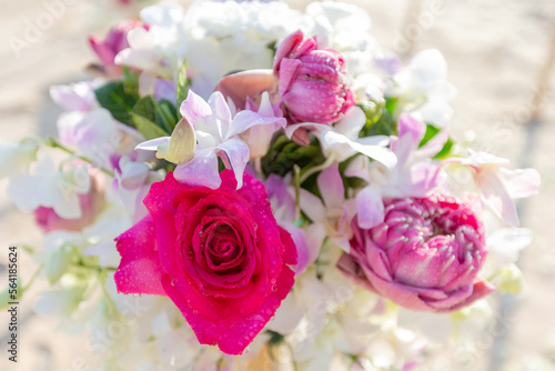 A large bouquet looks beautiful and stands out very eye-catching. There are many kinds of flowers  such as lotus flowers  orchids  roses  whose petals are dripping with fresh water.